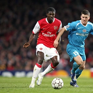 Emmanuel Adebayor (Arsenal) Jason Culina (PSV)