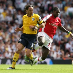 Emmanuel Adebayor (Arsenal) Jonathan Greening (WBA)