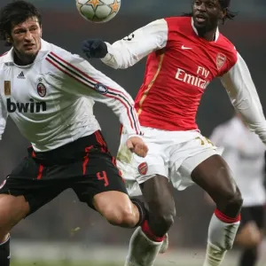 Emmanuel Adebayor (Arsenal) Kakha Kaladze (AC Milan) Emmanuel Adebayor (Arsenal) Kakha Kaladze (AC Milan)