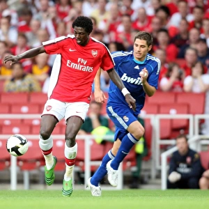 Emmanuel Adebayor (Arsenal) Miguel Torres (Real)