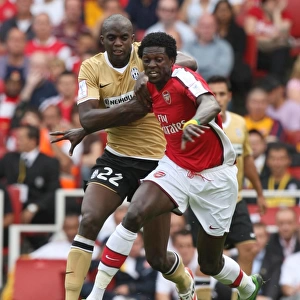 Emmanuel Adebayor (Arsenal) Mohamed Sissoko (Juve)