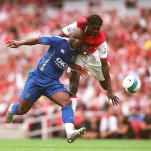 Emmanuel Adebayor (Arsenal) Noe Pamarot (Portsmouth) Emmanuel Adebayor (Arsenal) Noe Pamarot (Portsmouth)