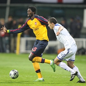 Emmanuel Adebayor (Arsenal) Roman Eremenko (Dynamo Kiev)