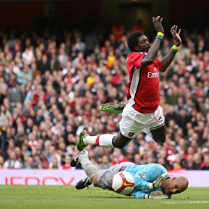 Emmanuel Adebayor (Arsenal) Tim Howard (Everton)