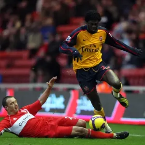 Emmanuel Adebayor (Arsenal) Tony McMahon (Middlesbrough) Emmanuel Adebayor (Arsenal) Tony McMahon (Middlesbrough)