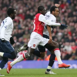 Emmanuel Adebayor (Arsenal) Younes Kaboul and Pascal Chimbonda (Tottenham) Emmanuel Adebayor (Arsenal) Younes Kaboul and Pascal Chimbonda (Tottenham)