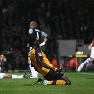 Emmanuel Adebayor celebrates the 1st Arsenal goal