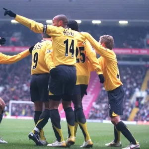 Emmanuel Adebayor celebrates scoring the 1st Arsenal goal with Thierry Henry