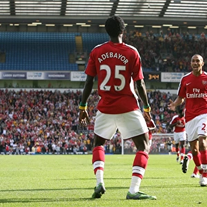 Emmanuel Adebayor celebrates scoring the 2nd Arsenal