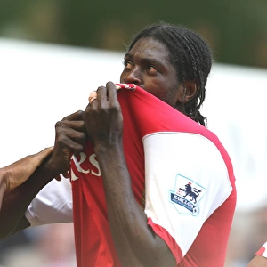 Emmanuel Adebayor celebrates scoring the 2nd Arsenal goal