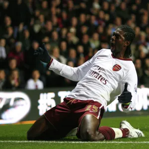 Emmanuel Adebayor celebrates scoring the 2nd Arsenal goal