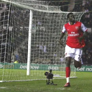 Emmanuel Adebayor celebrates scoring his 3rd and Arsenals 6th goal of the match