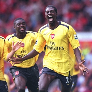 Emmanuel Adebayor celebrates scoring the Arsenal goal with Tomas Rosicky and Kolo Toure