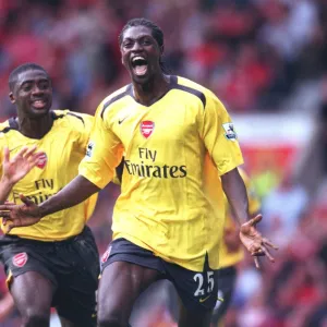 Emmanuel Adebayor celebrates scoring the Arsenal goal with Tomas Rosicky and Kolo Toure