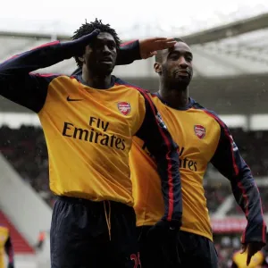 Emmanuel Adebayor celebrates scoring Arsenals goal