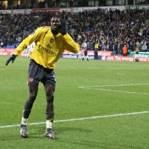Emmanuel Adebayor celebrates scoring hte 3rd Arsenal goal