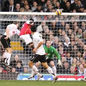 Emmanuel Adebayor heads past Fulham goalkeeper Antti Niemi to score the 2nd Arsenal goal