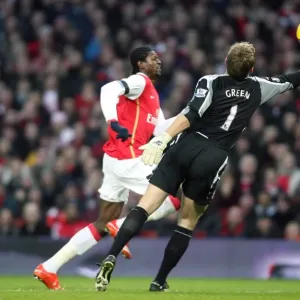 Emmanuel Adebayor rounds Robert Green (West Ham) on his way to scoring Arsenals 2nd goal Emmanuel Adebayor rounds Robert Green (West Ham) on his way to scoring Arsenals 2nd goal