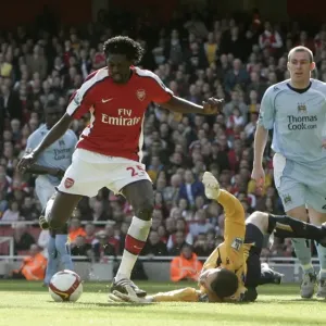 Emmanuel Adebayor rounds Shay Given Emmanuel Adebayor rounds Shay Given