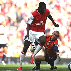 Emmanuel Adebayor rounds Stephen Bywater (Derby) to score Arsenal 2nd goal his 1st