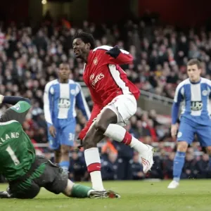 Emmanuel Adebayor scores Arsenals goal past Chris Kirkland (Wigan) Emmanuel Adebayor scores Arsenals goal past Chris Kirkland (Wigan)