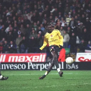 Emmanuel Adebayor shoots into an empty net to score the 3rd Arsenal goal