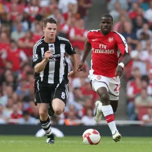 Emmanuel Eboue (Arsenal) Danny Guthrie (Newcastle) Emmanuel Eboue (Arsenal) Danny Guthrie (Newcastle)