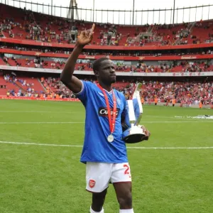 Emmanuel Eboue (Arsenal) with the Emirates Cup Trophy Emmanuel Eboue (Arsenal) with the Emirates Cup Trophy