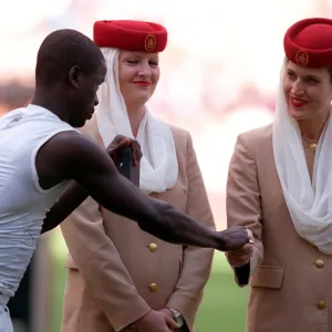 Emmanuel Eboue (Arsenal) with the Emirates Ladies