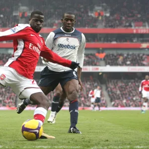 Emmanuel Eboue (Arsenal) Fabrice Muamba (Bolton)