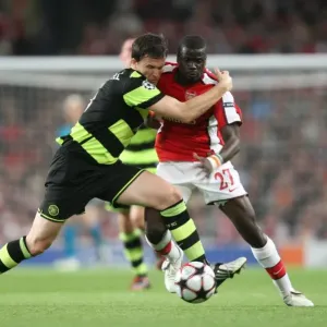 Emmanuel Eboue (Arsenal) Gary Caldwell (Celtic) Emmanuel Eboue (Arsenal) Gary Caldwell (Celtic)