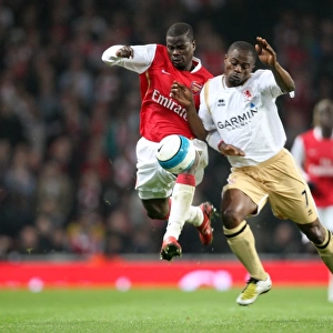 Emmanuel Eboue (Arsenal) George Boateng (Boro)