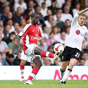 Emmanuel Eboue (Arsenal) Jimmy Bullard (Fulham)