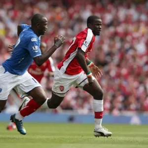Emmanuel Eboue (Arsenal) John Utaka (Portsmouth) Emmanuel Eboue (Arsenal) John Utaka (Portsmouth)