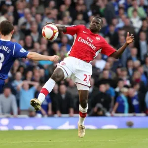 Emmanuel Eboue (Arsenal) Leighton Baines (Everton)