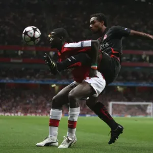 Emmanuel Eboue (Arsenal) Leonardo (Olympiacos) Emmanuel Eboue (Arsenal) Leonardo (Olympiacos)