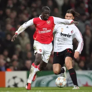 Emmanuel Eboue (Arsenal) Marek Jankulovski (AC Milan)