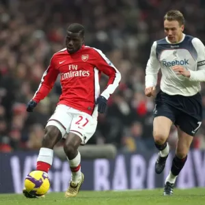 Emmanuel Eboue (Arsenal) Matt Taylor (Bolton) Emmanuel Eboue (Arsenal) Matt Taylor (Bolton)