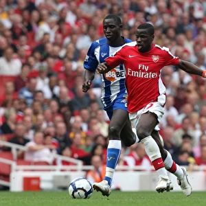 Emmanuel Eboue (Arsenal) Mohamed Diame (Wigan)
