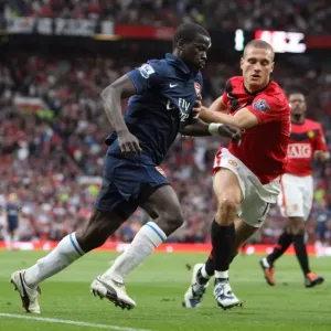 Emmanuel Eboue (Arsenal) Nemanja Vidic (Man Utd) Emmanuel Eboue (Arsenal) Nemanja Vidic (Man Utd)