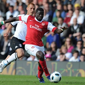 Emmanuel Eboue (Arsenal) Steve Sidwell (Fulham). Fulham 2: 2 Arsenal, Barclays Premier League