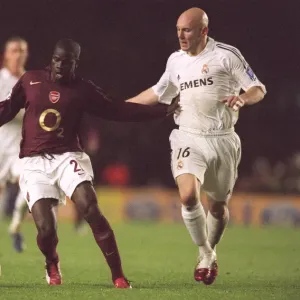 Emmanuel Eboue (Arsenal) Thomas Gravesen (Real Madrid) Emmanuel Eboue (Arsenal) Thomas Gravesen (Real Madrid)