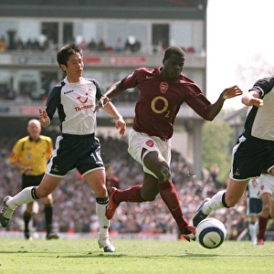 Emmanuel Eboue (Arsenal) Young-Pyo Lee and Michael Carrick (Tottenham)