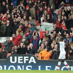 Emmanuel Eboue celebrates with the Arsenal fans after the match. Arsenal 5: 0 FC Porto Emmanuel Eboue celebrates with the Arsenal fans after the match. Arsenal 5: 0 FC Porto