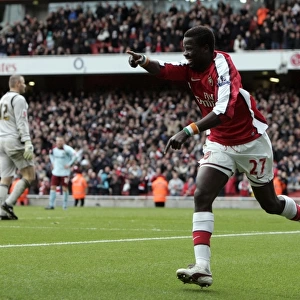 Emmanuel Eboue celebrates scoring Arsenals 3rd goal