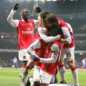 Print of Emmanuel Adebayor celebrating with teammates Print of Emmanuel Adebayor celebrating with teammates