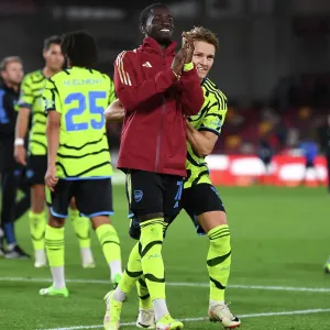 Emotional Reunion: Martin Odegaard and Charles Sagoe Jr after Arsenal's Carabao Cup Victory at Brentford