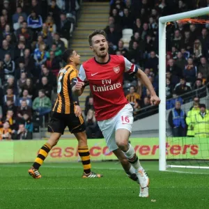 Euphoria Unleashed: Aaron Ramsey's Thrilling Goal Celebration vs. Hull City, Premier League 2013-2014