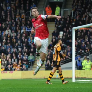 Euphoria Unleashed: Aaron Ramsey's Thrilling Goal Celebration vs. Hull City, Premier League 2013-2014