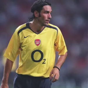 Euphoria Unleashed: Robert Pires Scores the Winning Goal for Arsenal at Amsterdam Tournament (2005), Ajax Arena Euphoria Unleashed: Robert Pires Scores the Winning Goal for Arsenal at Amsterdam Tournament (2005), Ajax Arena
